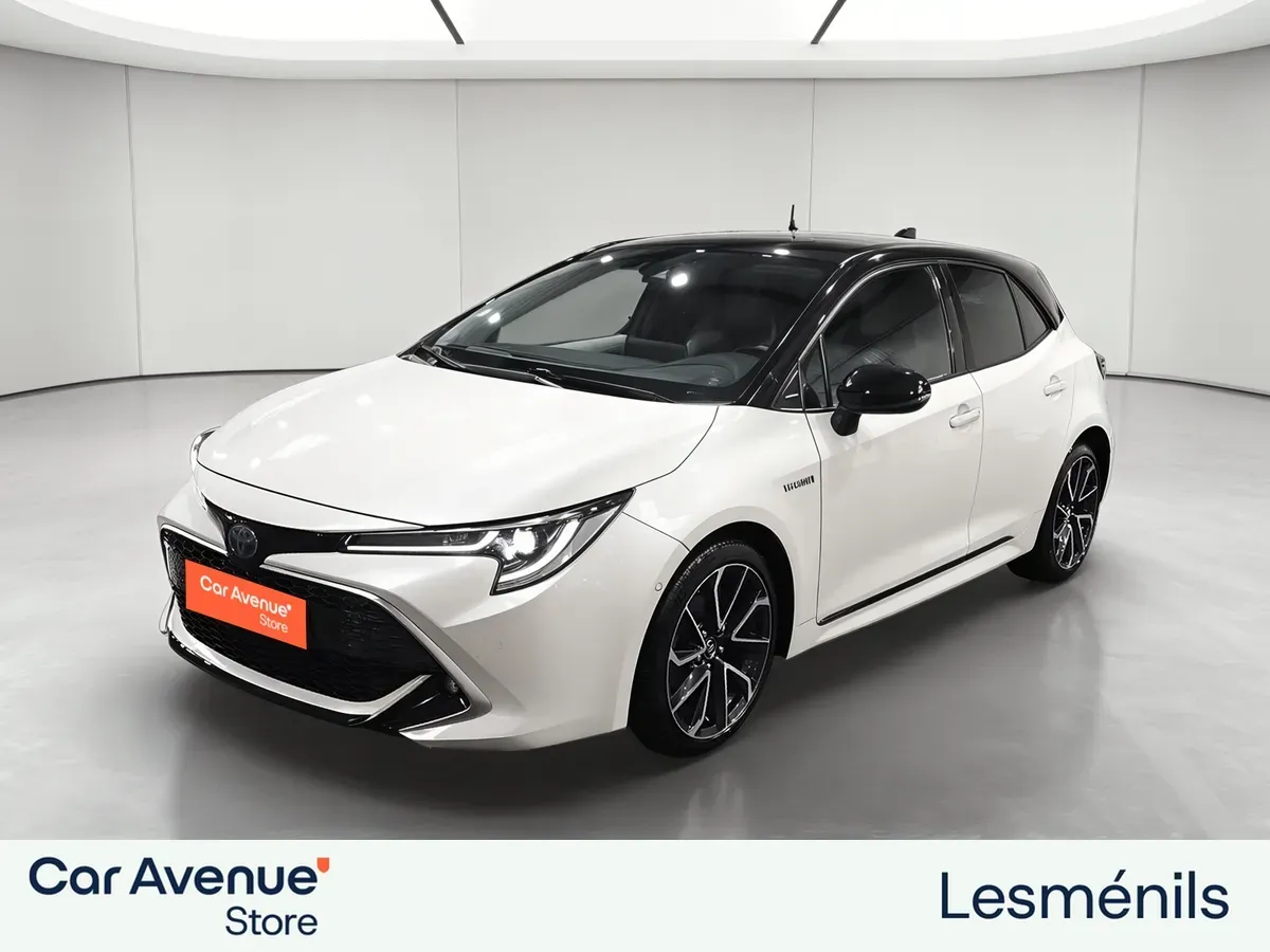 Toyota COROLLA HYBRIDE blanc d'occasion